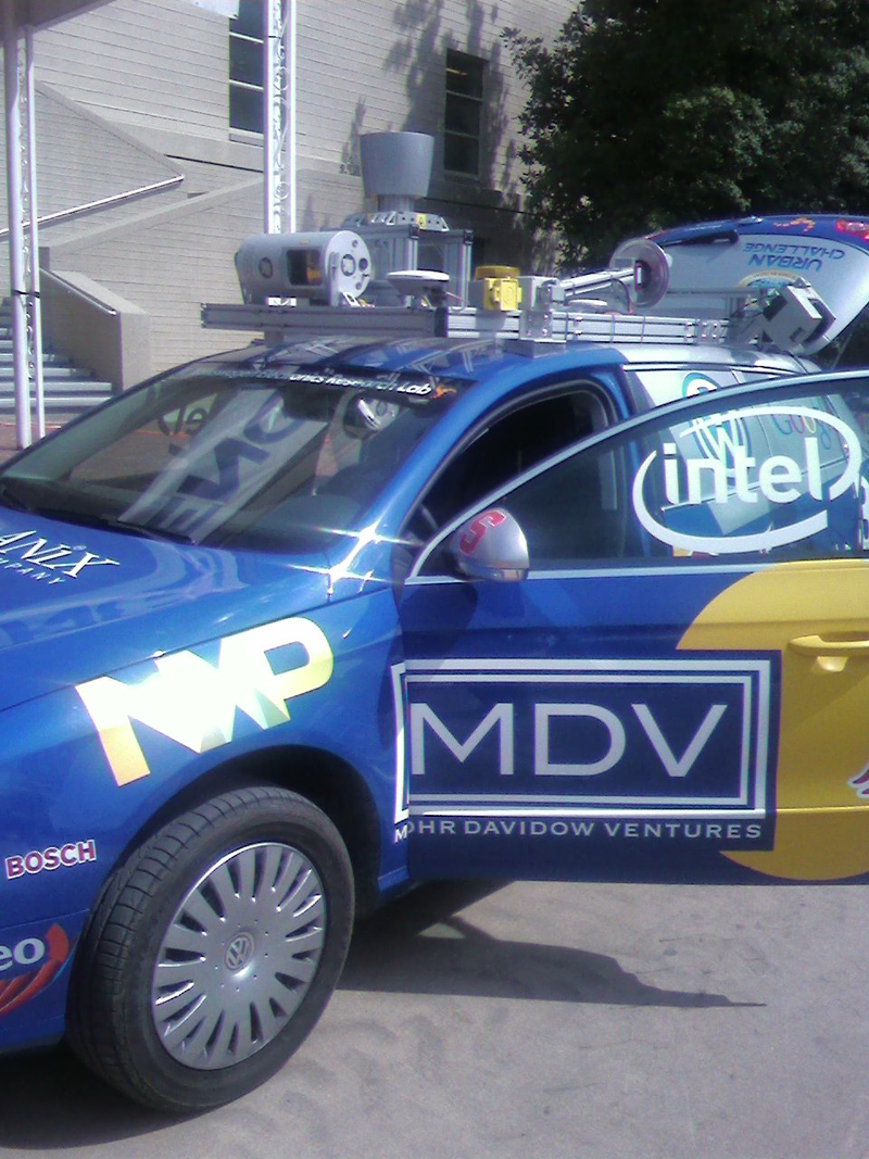 Illustration for article titled DARPA Urban Challenge Cars Invading Pentagon Parking Lot